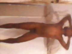 Nude dance of a sexy man .