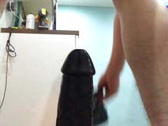 Pantie stuffing with huge dildo g string inside