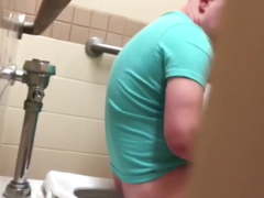 Cute guy caught jerking off in the men's room