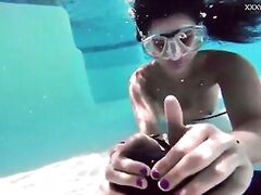 Brita Piskova masturbates underwater in the swimming pool