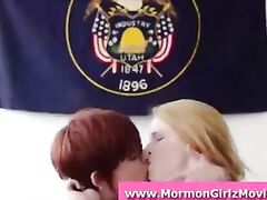 Redhead lesbian fucks Mormon teen with a strapon