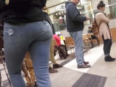 Young gay girl in tight tight jeans at the mall