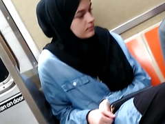 Cute Muslim girl on train