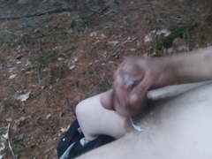 Straight male jerking in the woods nude